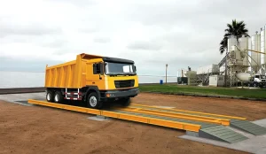 Truck weighing system untuk pencatatan berat kendaraan di area industri